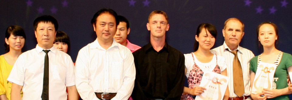 Wang Hongyu (Harbin Organization Director), Tao Yabing (Director of Music College of Harbin Normal University), Frederic Deschamps and Viatcheslav Semenenko.