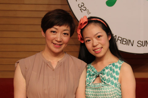 Crystal Wang with student Wang Jie.