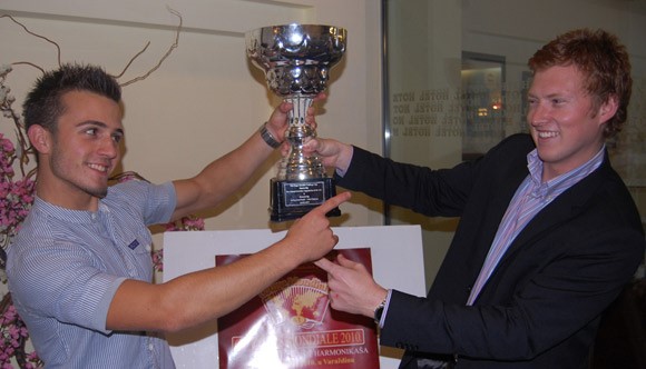 Petar Maric receives the World Cup from Grayson Masefield