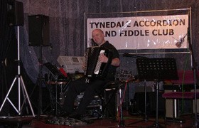 John Morgan playing at the Tynedale Accordion and Fiddle Club,