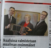newspaper article, pictured Kevin Friedrich, Sirpa Sippola and Kimmo Mattila