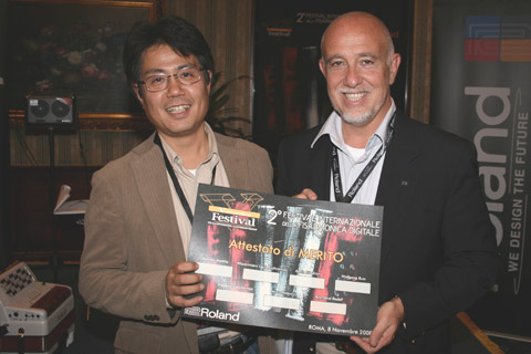 Akira Hanechi (Roland Europe SpA. Manager) and Luigi Bruti, (Marketing Director of Roland Europe SpA.) 