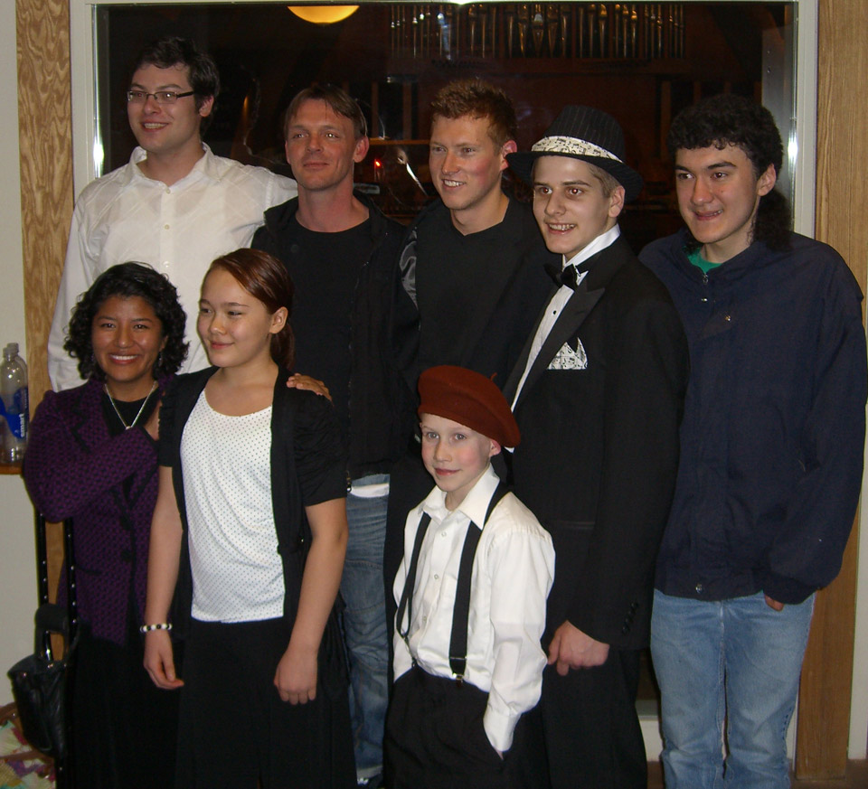 Back row, left to right: Yev Nosov, Frederic Deschamps, Grayson Masefield, Emmanuel Gasser, Grabriel Soileau. Front row, left to right: Patricia Bartell, Naomi Harris, Emil Haroldsen.