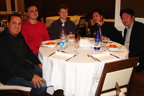 Marco Cinaglia sharing dinner with contestants from Japan and Jun-ichi Suzuki 