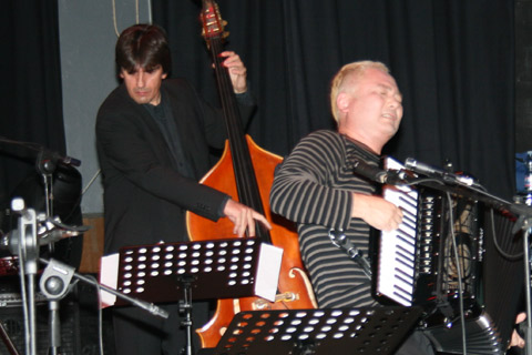 Coba fronting the band