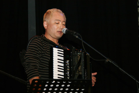 Coba fronting the band