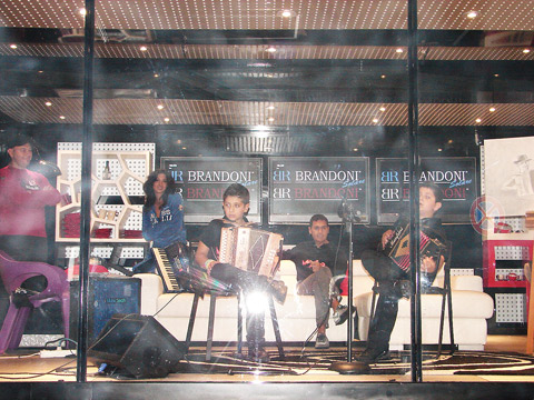 Alessandro (left) and Gabriele (right) Guglielmi in the reality show bus.